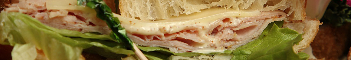 Eating Sandwich Cafe at Pressed Cafe restaurant in Nashua, NH.
